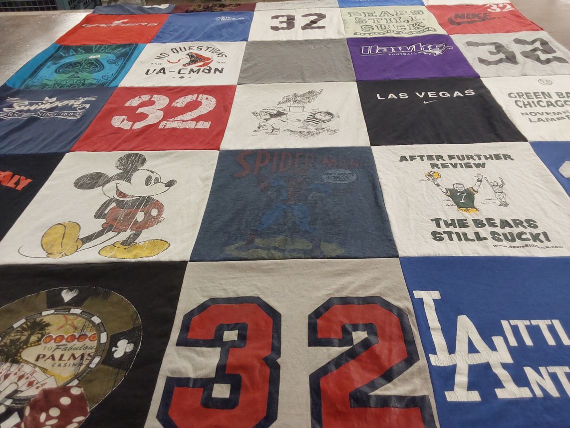 T-shirt quilt with disney, sports themes by Lauren from WI