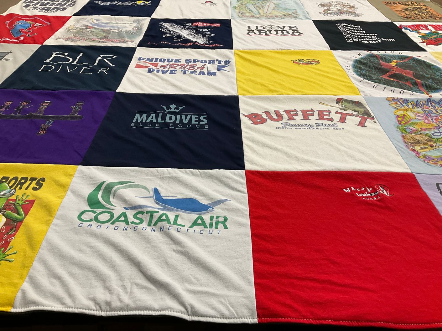 T-shirt quilt with diving, travel themes by Kirsten from RI