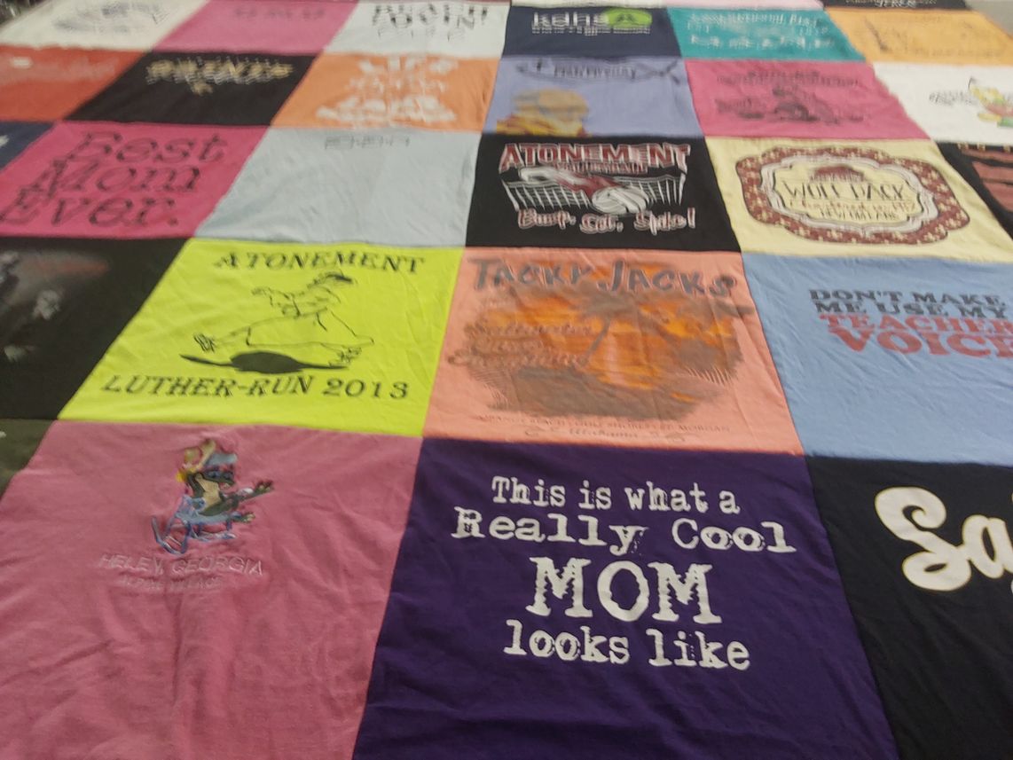 T-shirt quilt with family, education themes by Lisa from LA