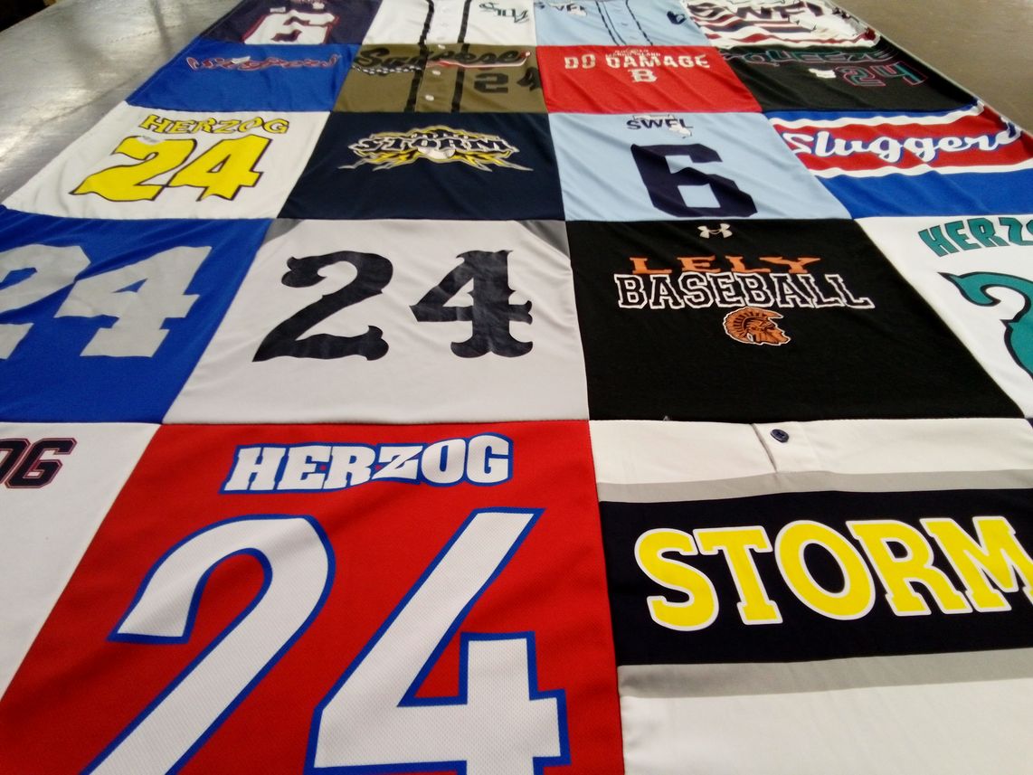 T-shirt quilt with sports themes by Trisha from FL