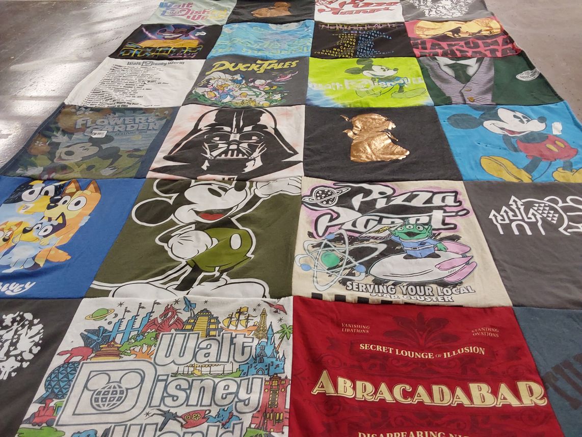 T-shirt quilt with cartoons, amusement parks themes by Thomas from GA