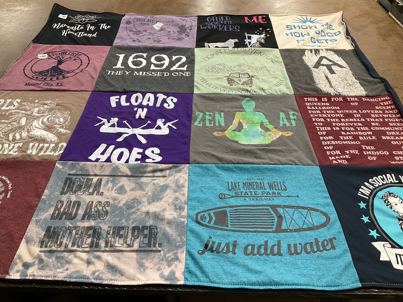 T-shirt quilt with self-improvement, social causes themes by Amy from NM