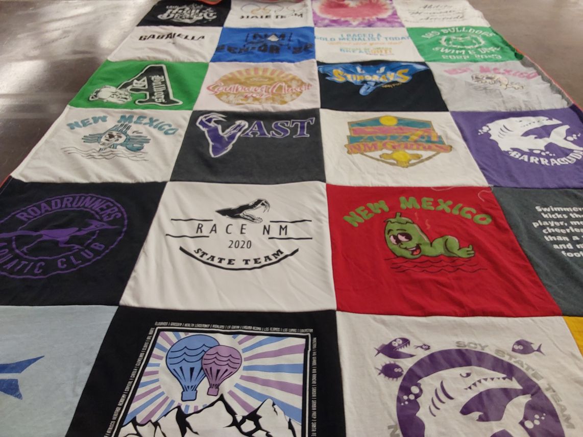 T-shirt quilt featuring new mexico road runners swimming team by Marc from NM