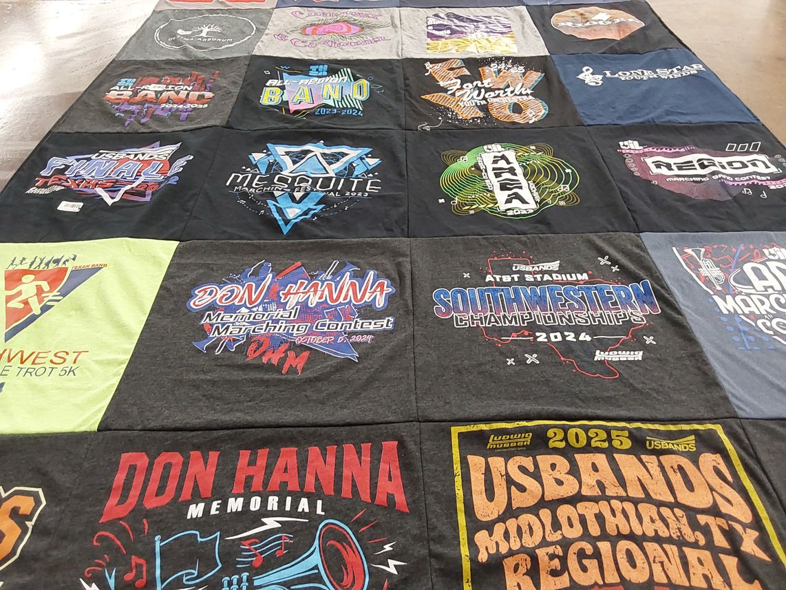 T-shirt quilt with marching band, music themes by Jamie from TX