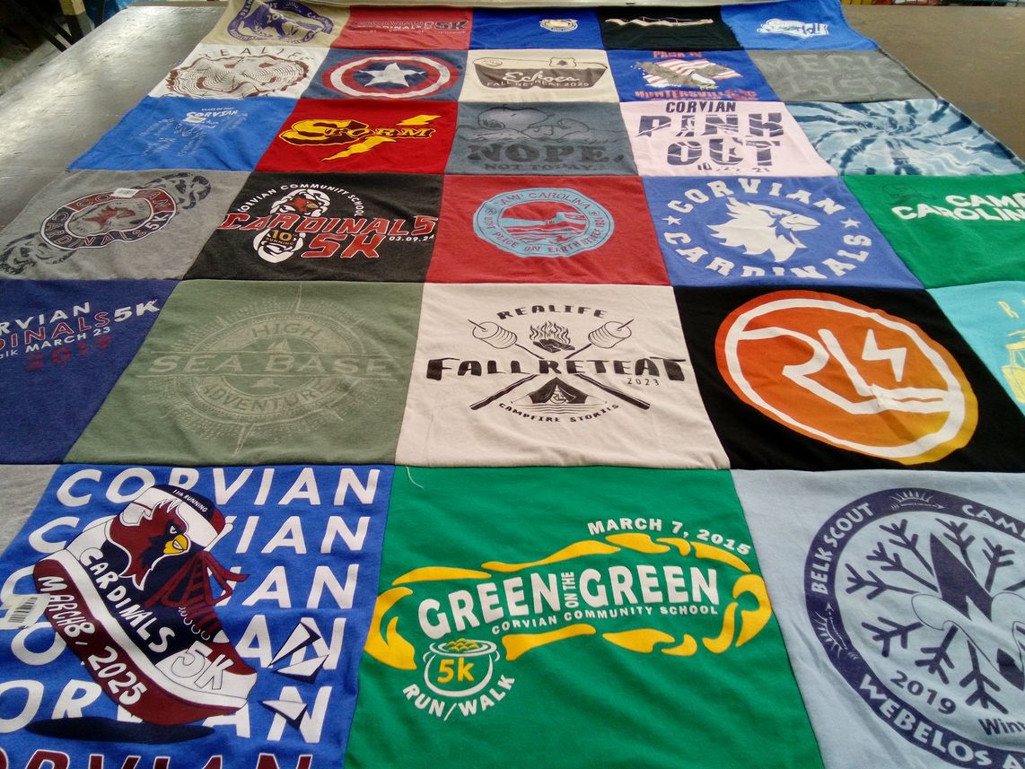 T-shirt quilt featuring corvian cardinals by Amy from NC