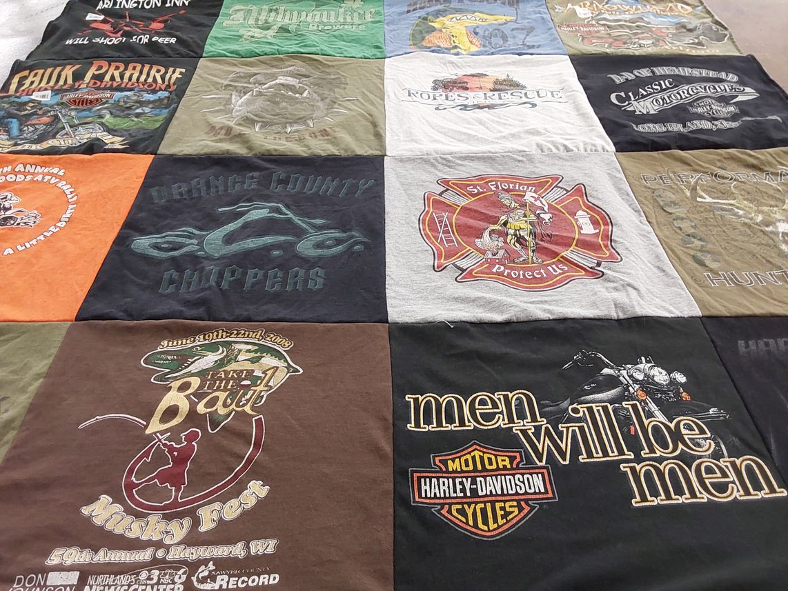 T-shirt quilt with motorcycles, fishing themes by Jacob from WI