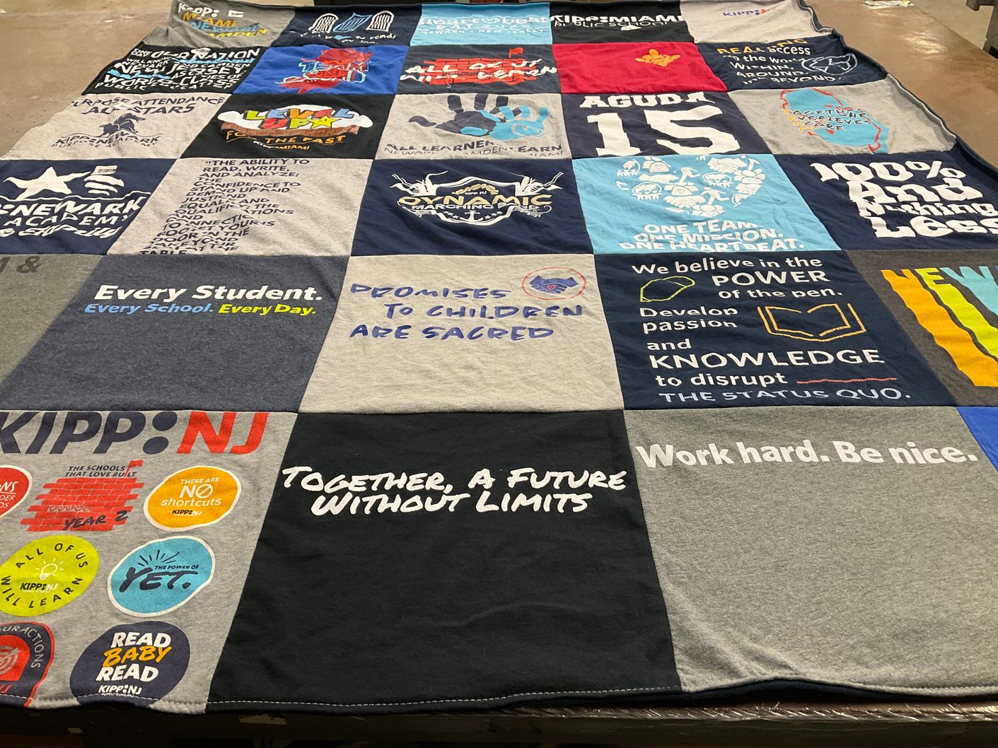 T-shirt quilt with education, reading themes by Sarba from NJ