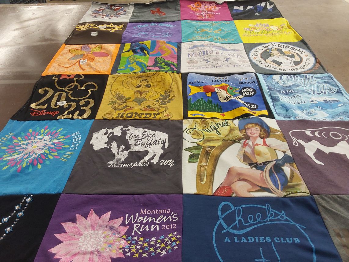 T-shirt quilt with running, outdoors themes by Vivian from WY