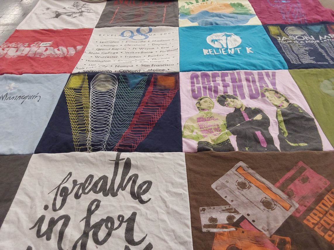 T-shirt quilt with music, concerts themes by Alana from MT
