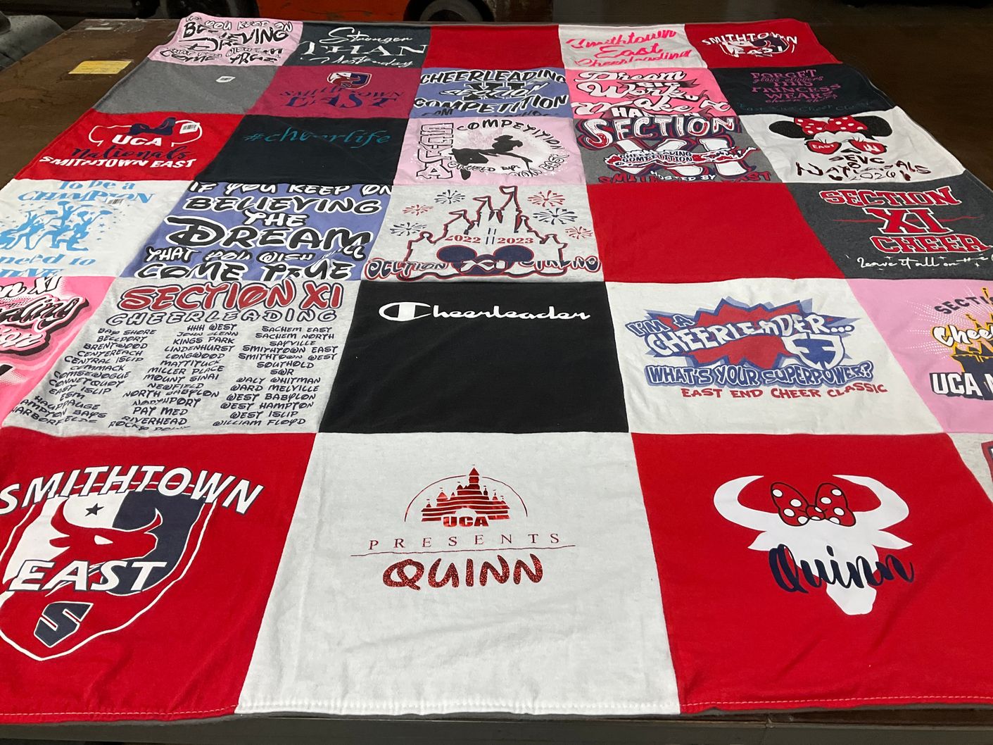 T-shirt quilt featuring smithtown east cheerleading team by ALLISON from NY