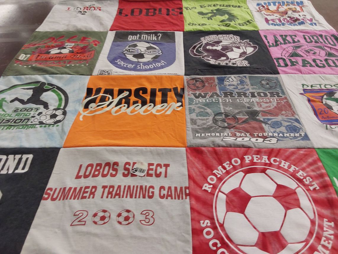T-shirt quilt featuring lobos, lake onion dragons by Jessica from MI