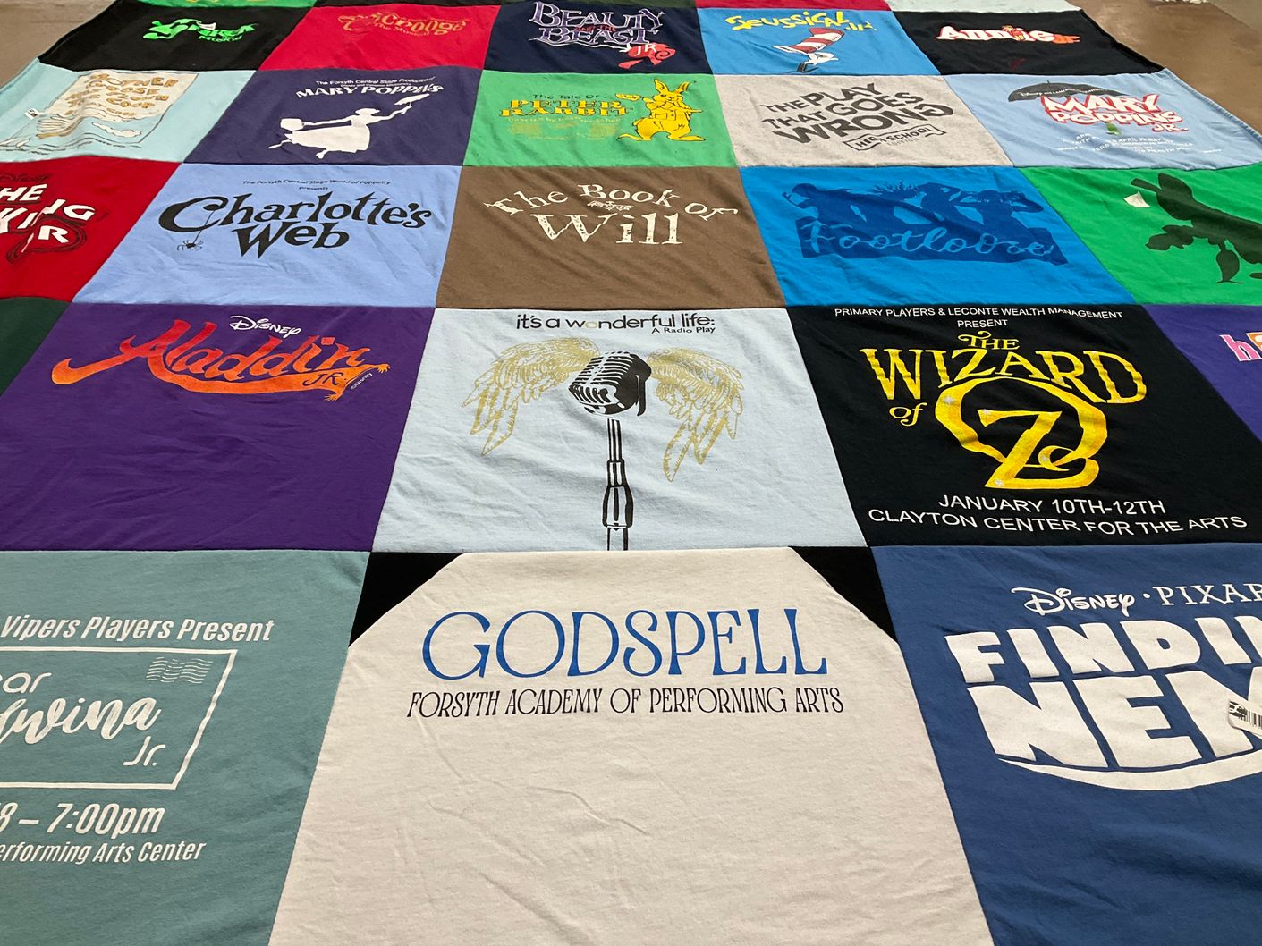 T-shirt quilt with musicals, theater themes by Kate from GA