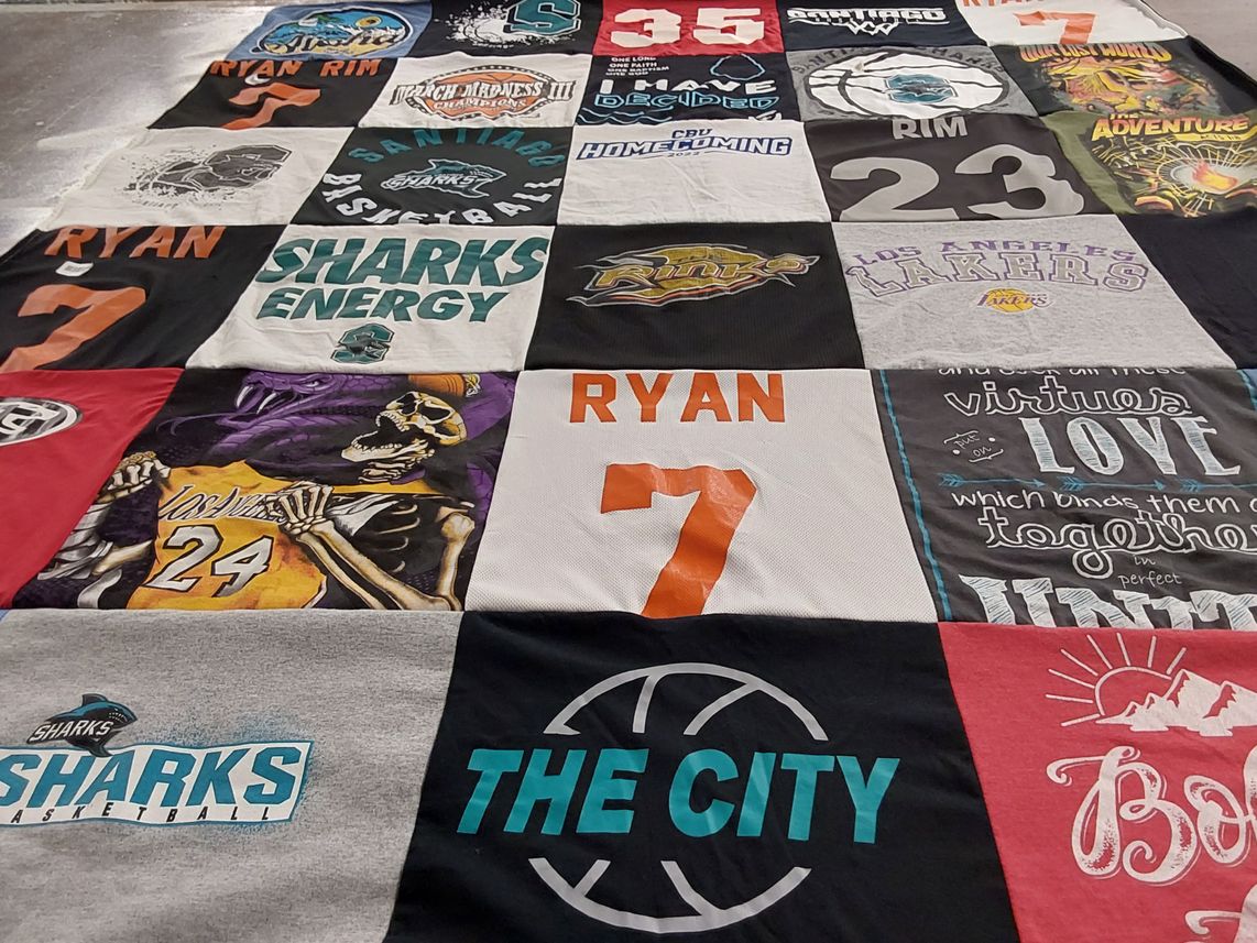 T-shirt quilt featuring los angeles lakers, santiago high school basketball by Laura from CA
