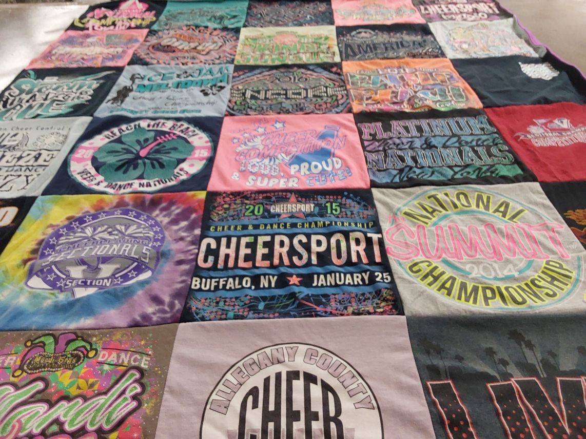 T-shirt quilt with cheerleading, dance competitions themes by Michelle from NY