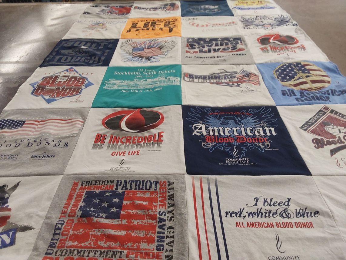 T-shirt quilt with blood donation, community service themes by Denise from MN
