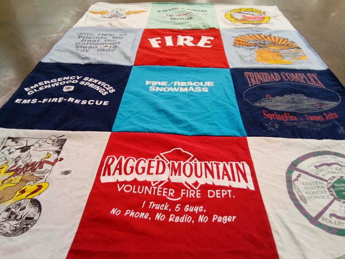 T-shirt quilt with firefighting, emergency services themes by Cynthia from CO