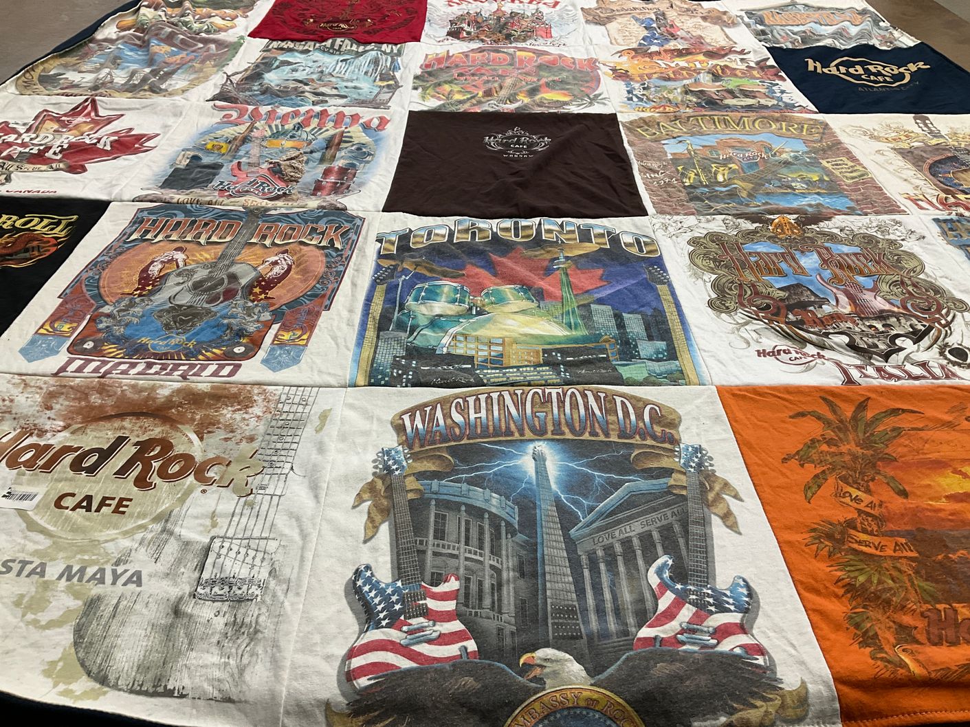 T-shirt quilt with music, travel themes by rachel from CA