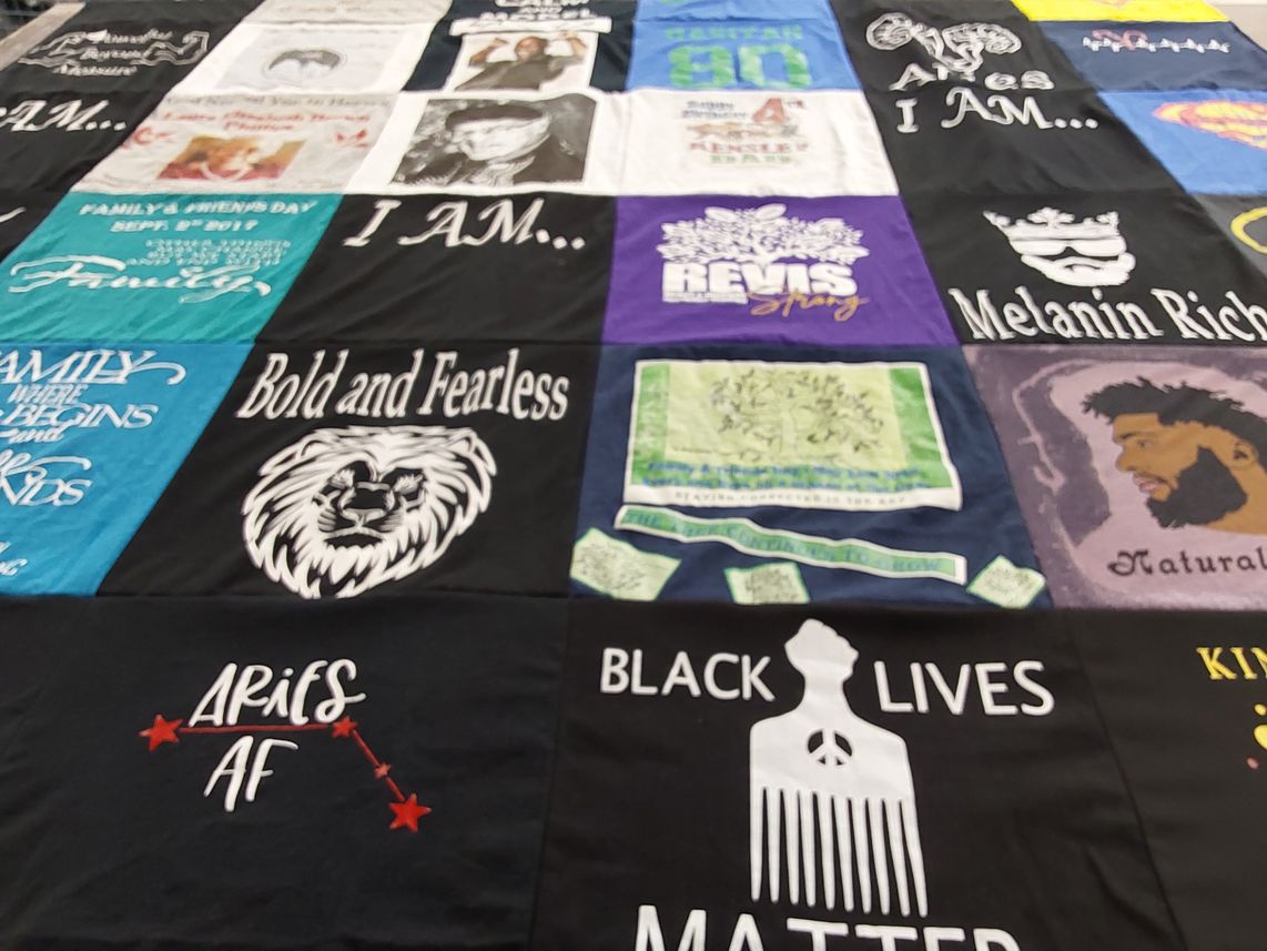 T-shirt quilt with family, activism themes by Lakendrick from NC