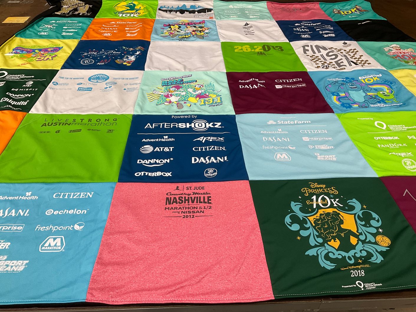 T-shirt quilt with running, marathons themes by Michelle from MO