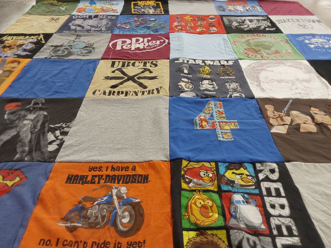 T-shirt quilt with music, movies themes by Dana from PA