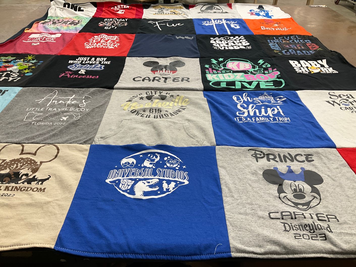 T-shirt quilt with family, travel themes by Michelle from TX
