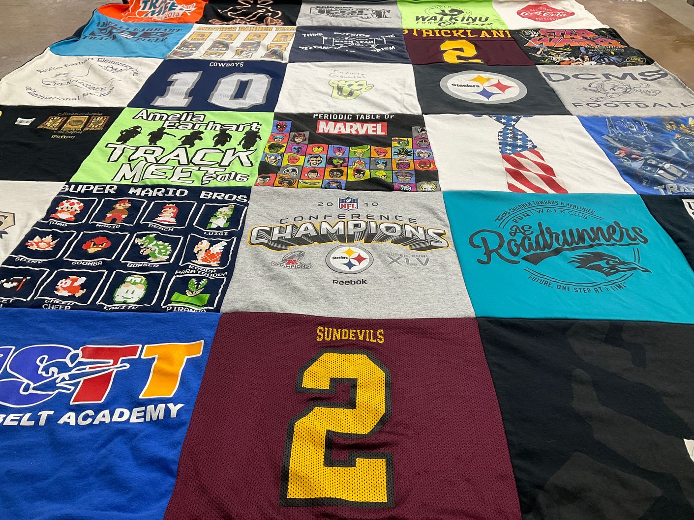 T-shirt quilt featuring university of phoenix sun devils, department of education roadunners by Julianna from GA