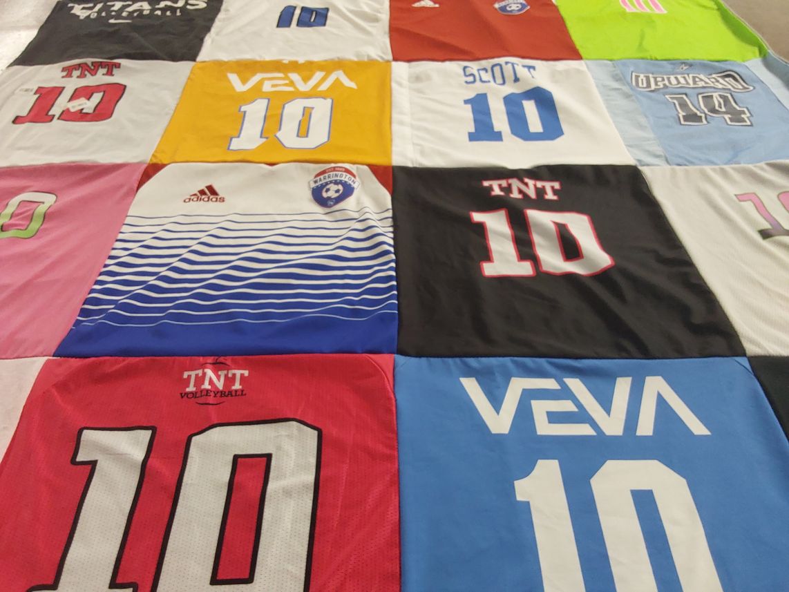 T-shirt quilt with sports, volleyball themes by Deborah from PA
