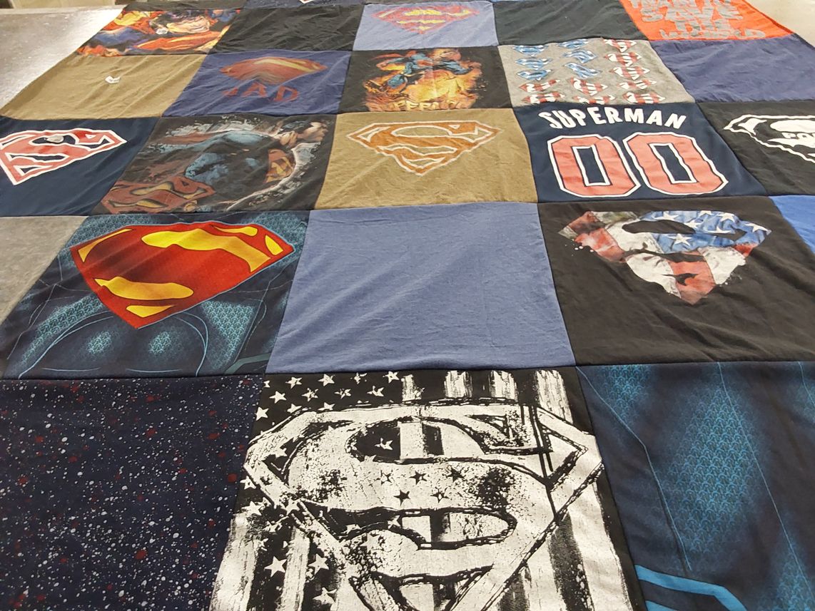 T-shirt quilt with superheroes themes by Christine from PA