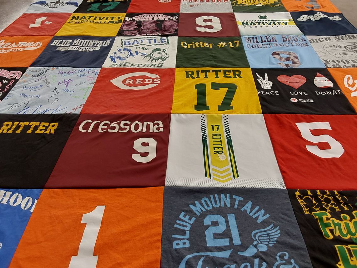 T-shirt quilt featuring blue mountain football team, nativity football team by Lavinia from PA