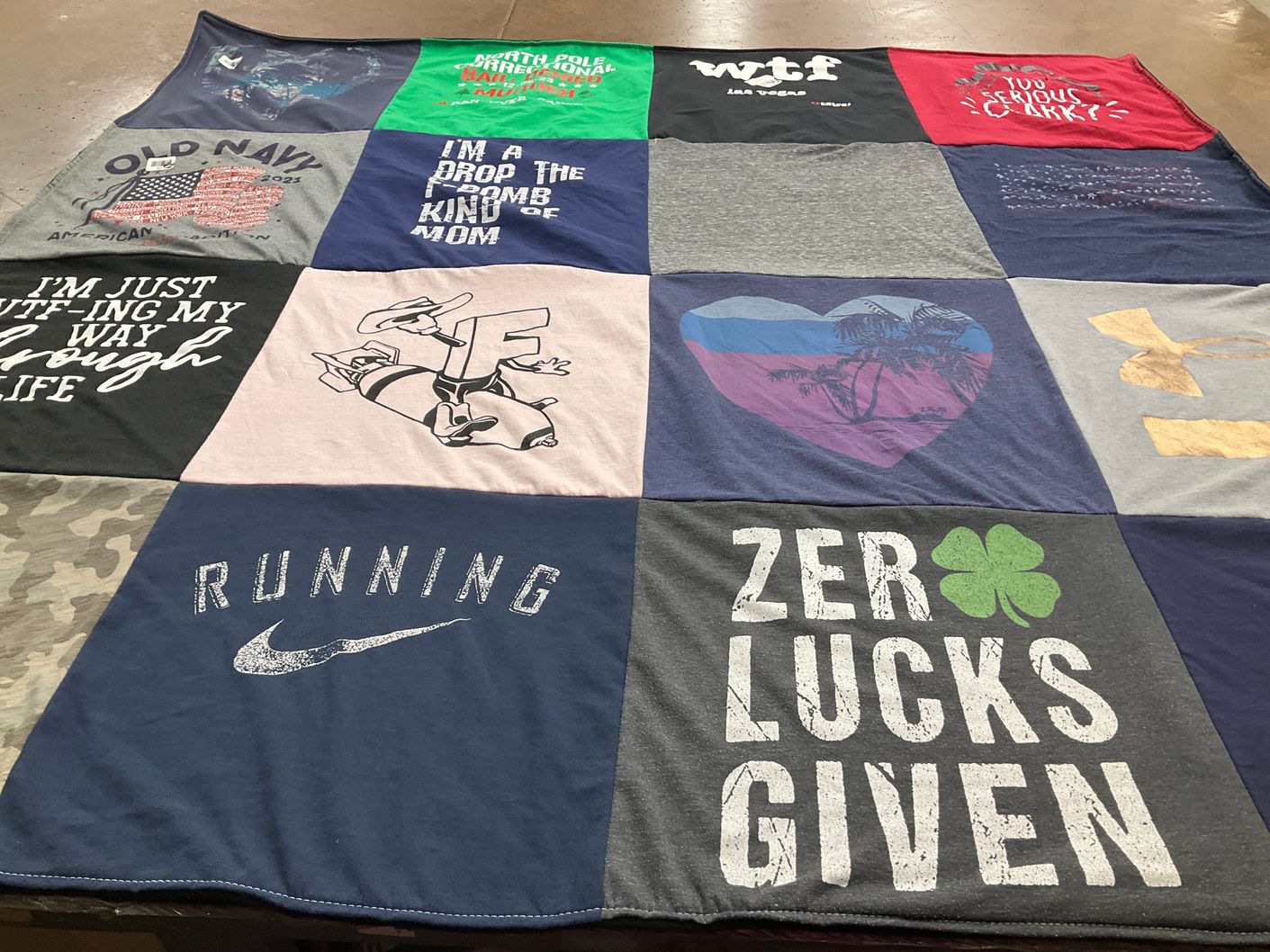 T-shirt quilt with running themes by Kelly from OH