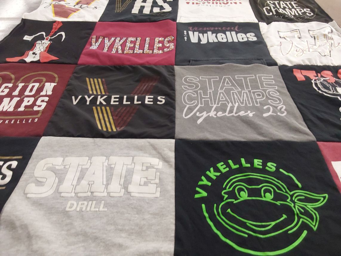 T-shirt quilt featuring vyks by Kristi from UT