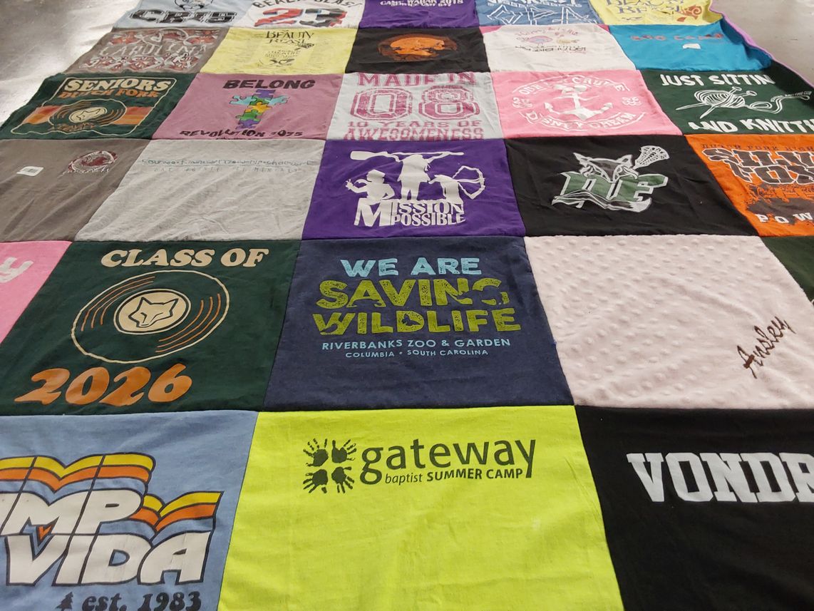 T-shirt quilt with wildlife, community service themes by Christie from SC