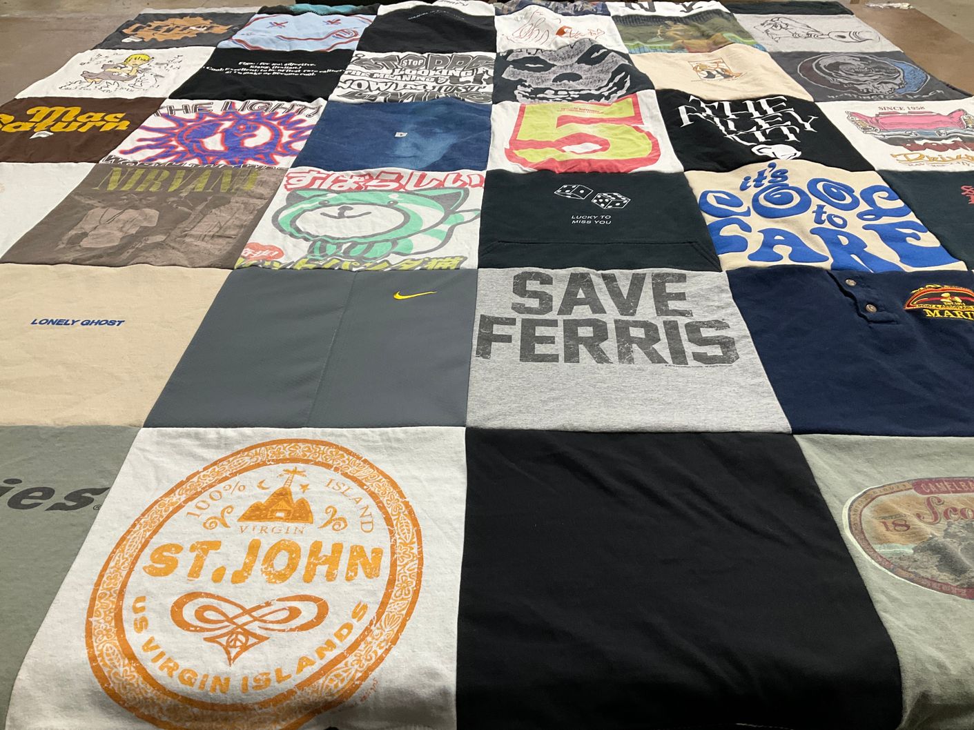 T-shirt quilt with fashion, humor themes by Kelley from MI