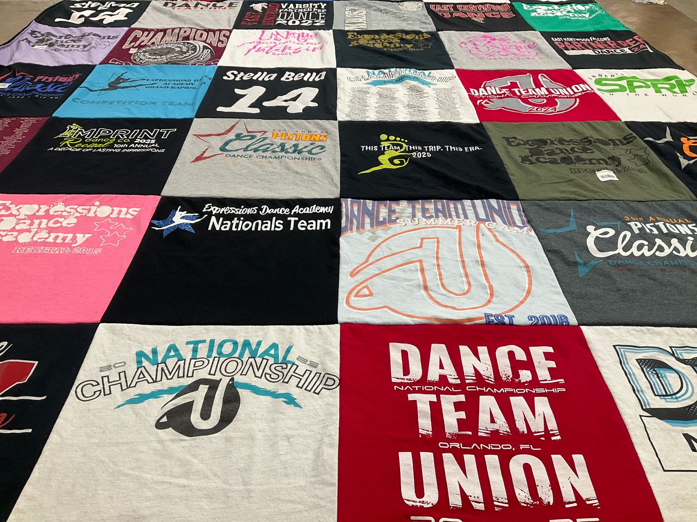 T-shirt quilt with dance, competition themes by Emilie from MI
