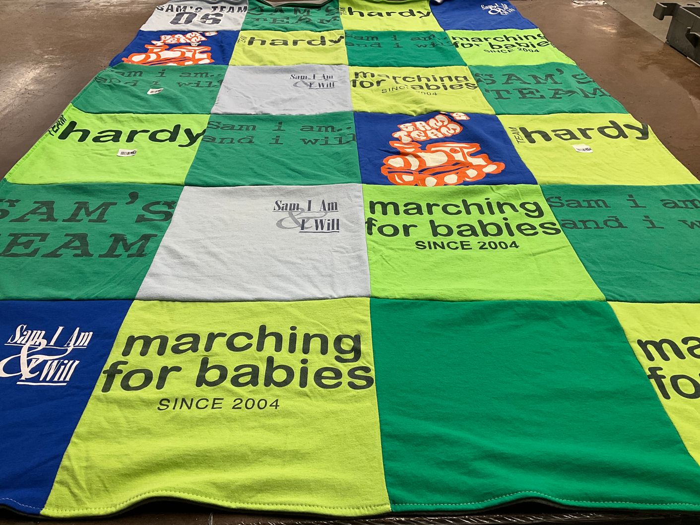 T-shirt quilt with community service, fundraising themes by Paige from NE