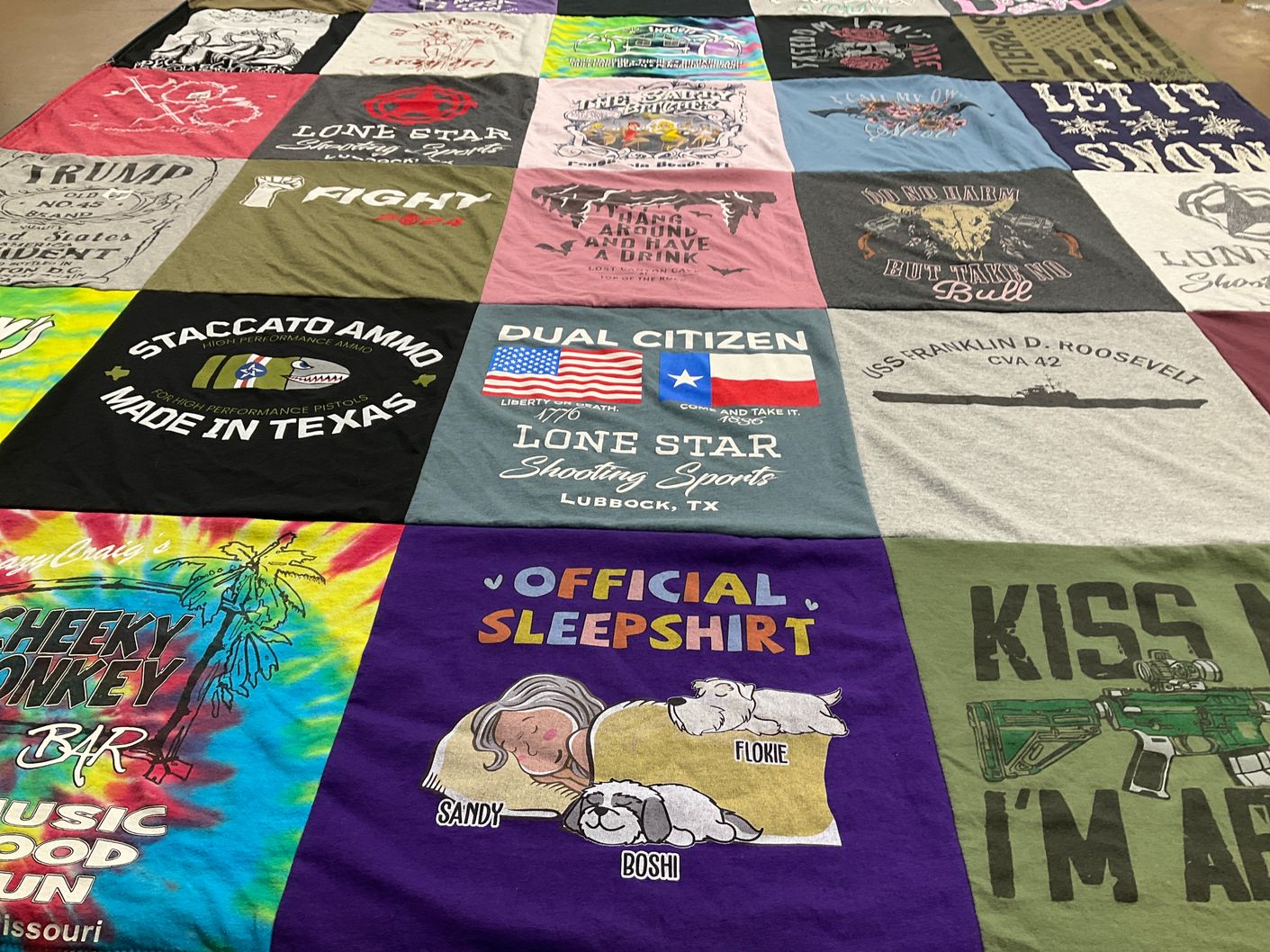 T-shirt quilt with shooting sports, food themes by sandra from TX