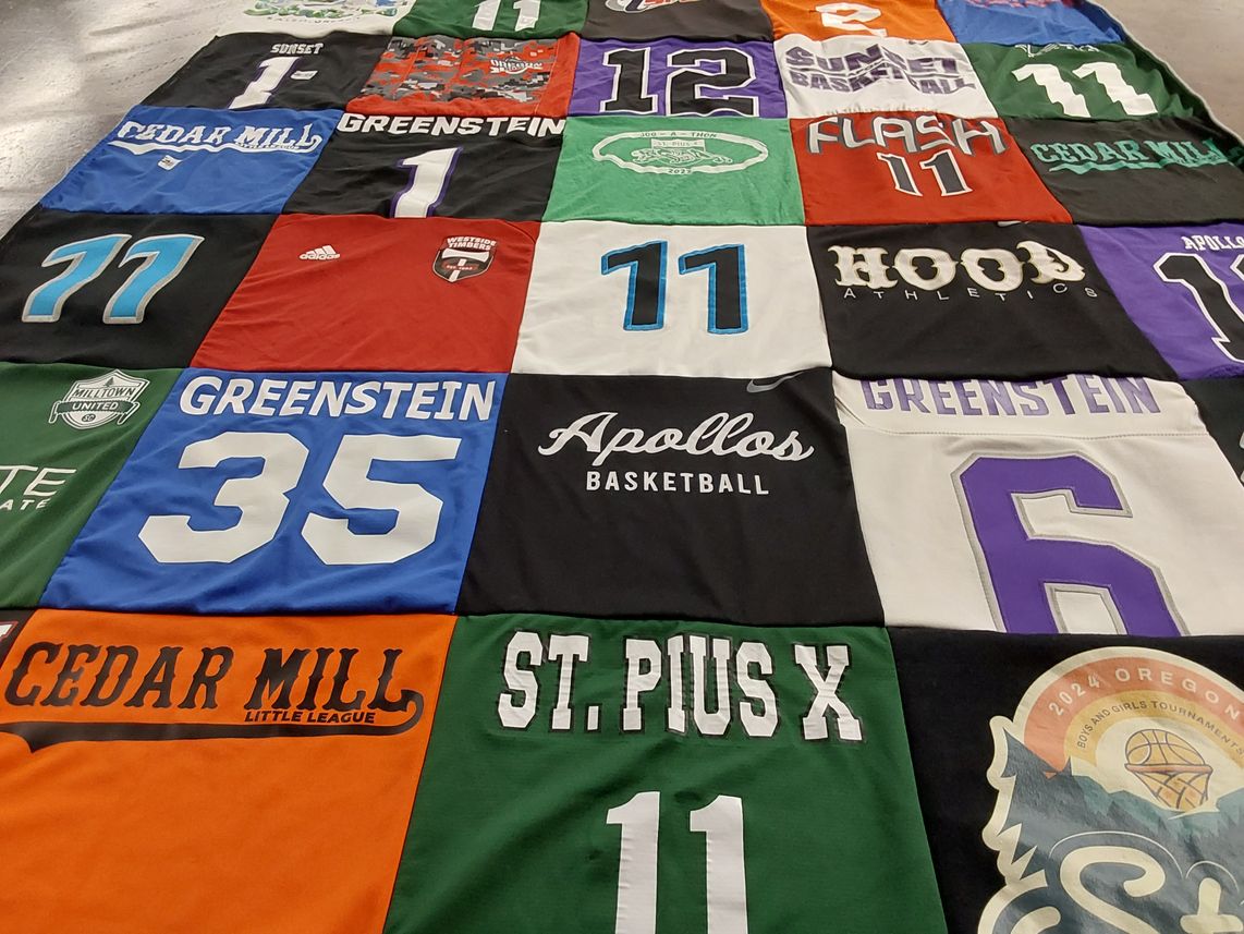 T-shirt quilt from st pius x school by Jennie from OR