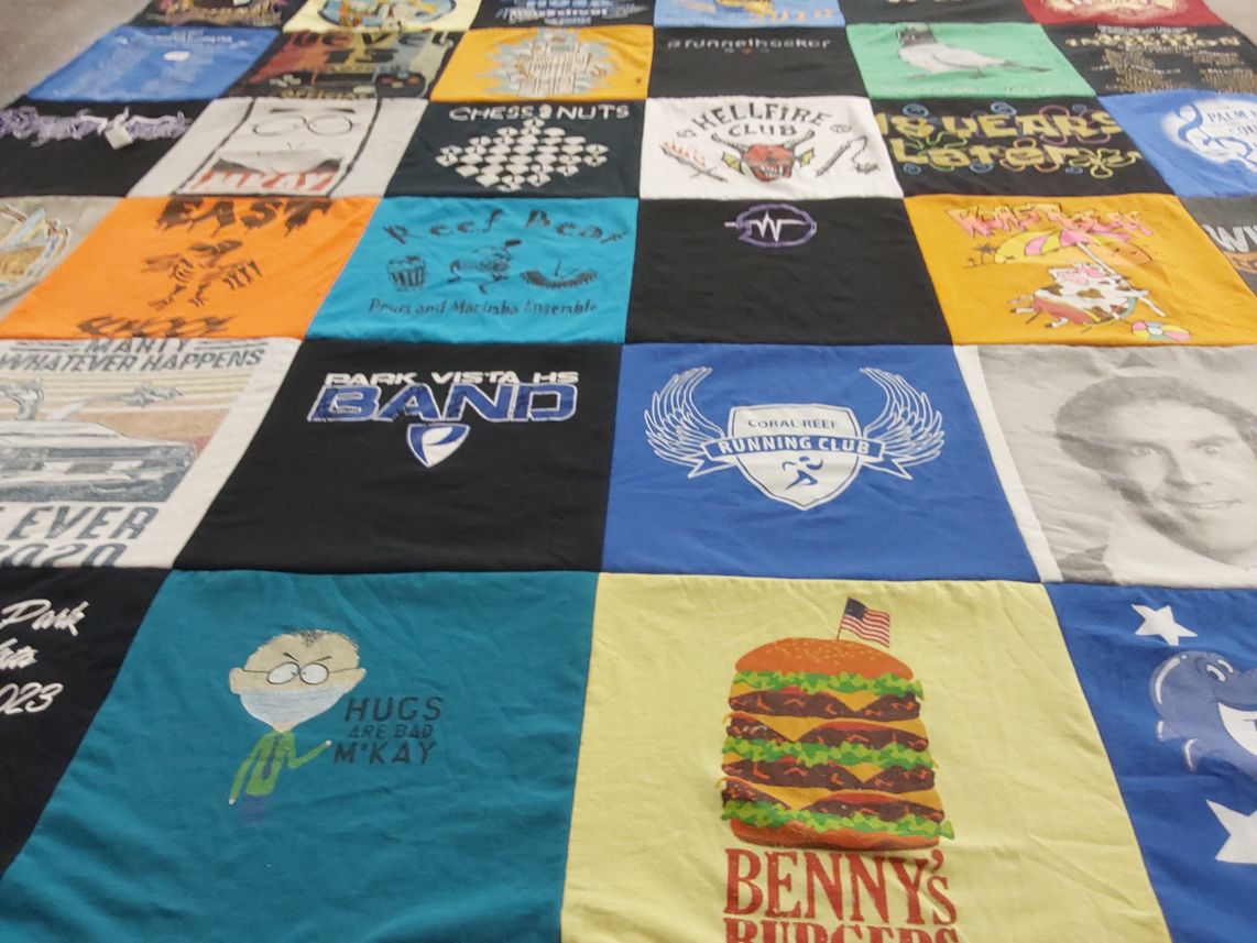 T-shirt quilt featuring coral reef running club by Kaurie from FL