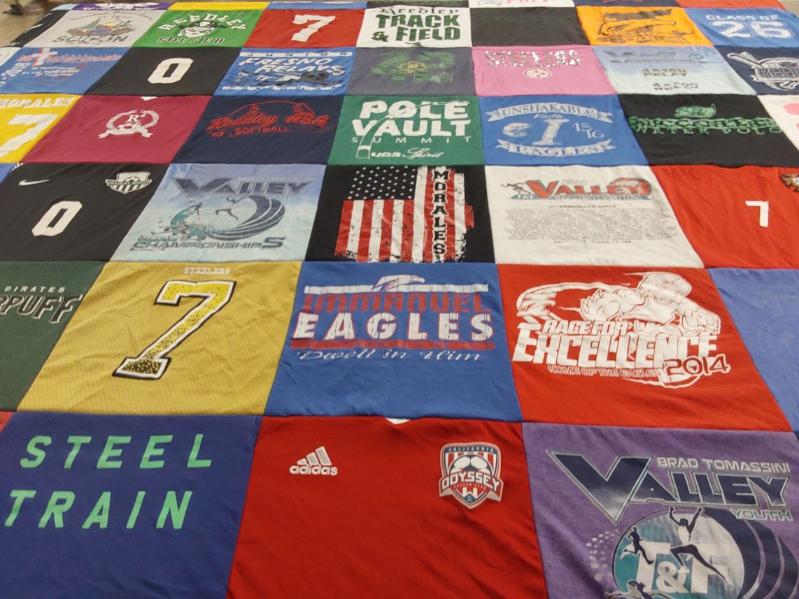 T-shirt quilt with sports, athletics themes by Louie from CA