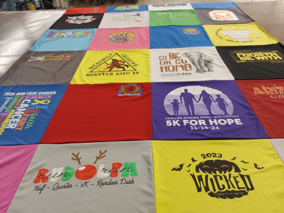 T-shirt quilt with running, cancer awareness themes by Lisa from AZ