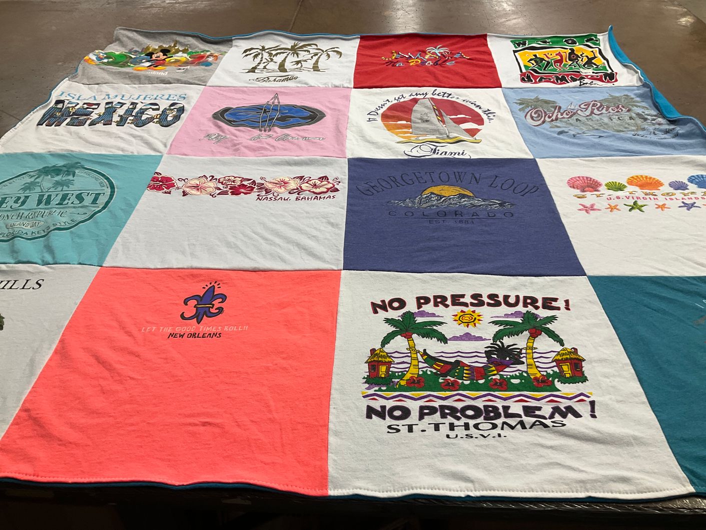 T-shirt quilt with travel, beaches themes by Micki from IA