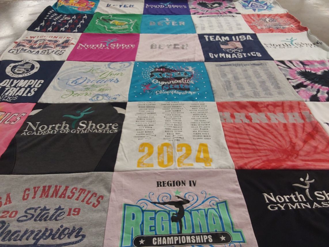 T-shirt quilt with gymnastics, sports themes by Kim from WI