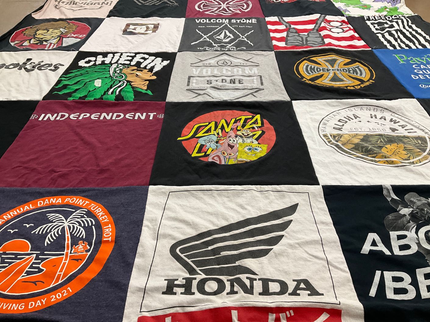 T-shirt quilt with skateboarding, surfing themes by Laura from CA