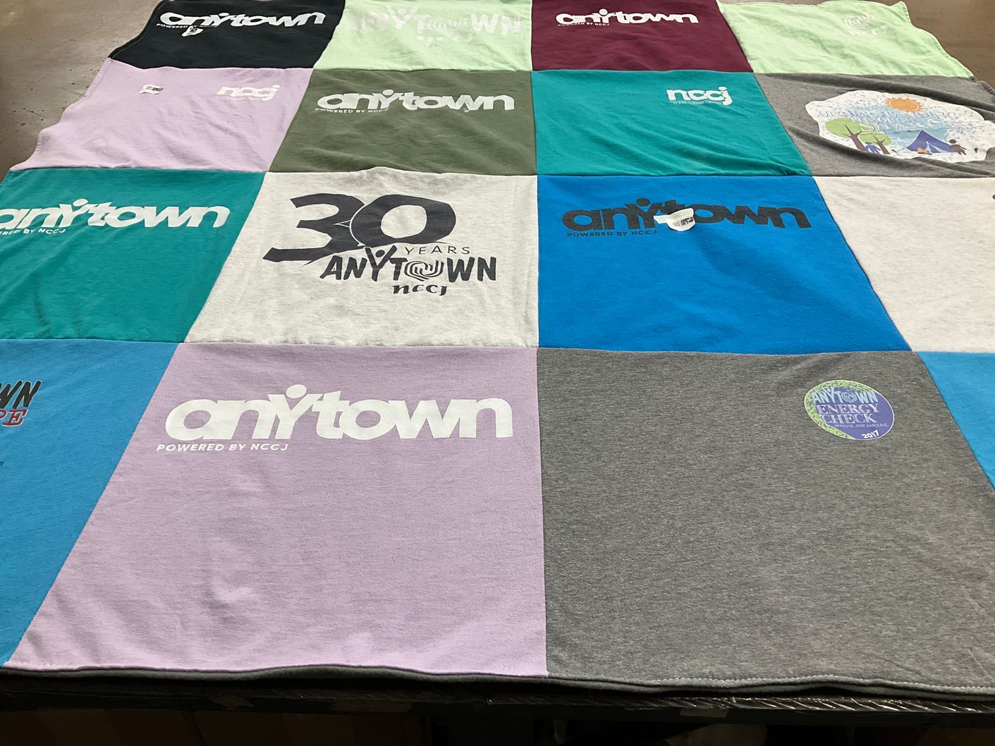 T-shirt quilt with community, youth themes by Christopher from NC