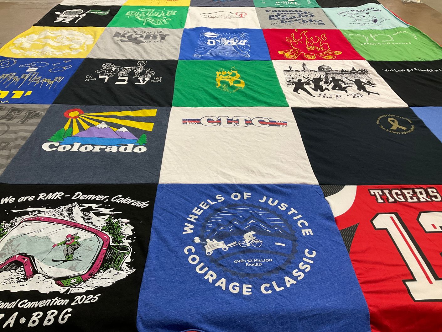 T-shirt quilt with skiing themes by Melanie from CO