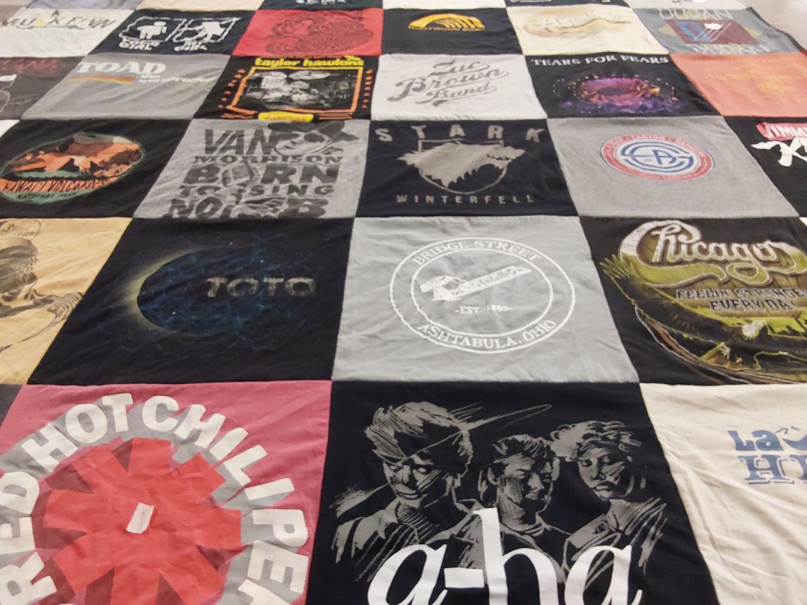 T-shirt quilt with music, bands themes by Joanne from CA