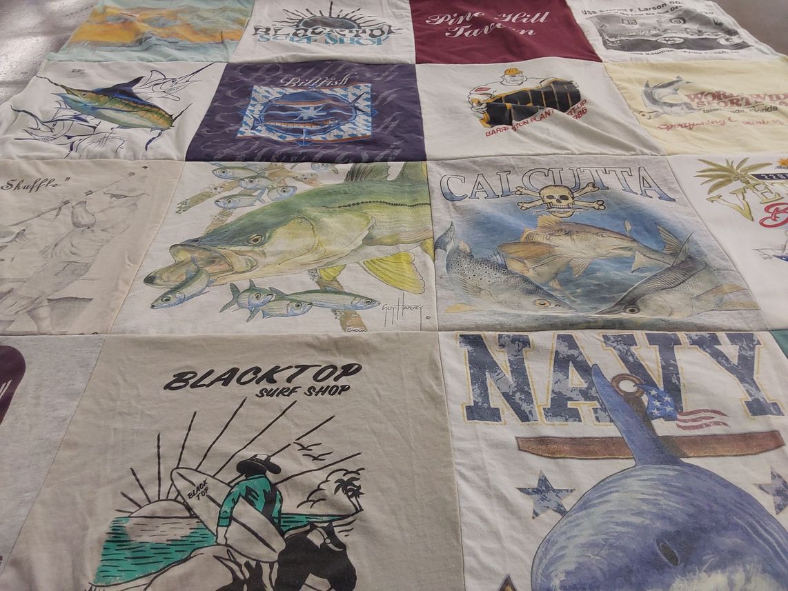T-shirt quilt with fishing, surfing themes by Sandy from FL