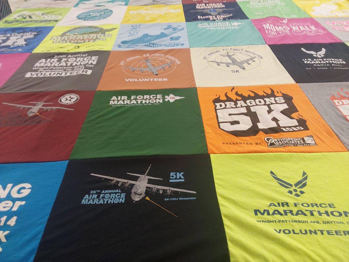 T-shirt quilt with running, volunteering themes by Rita from OH