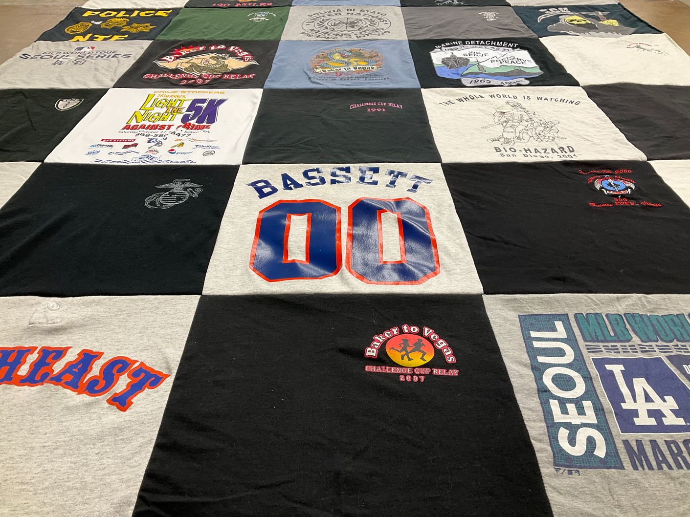 T-shirt quilt with running, awareness themes by Tod from TN