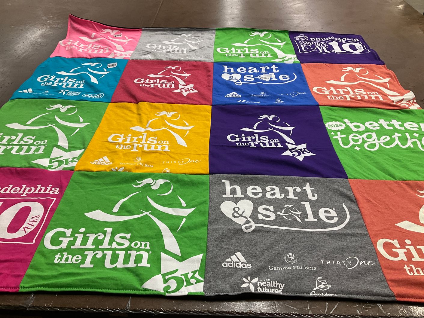 T-shirt quilt with running, fitness themes by Heather from PA